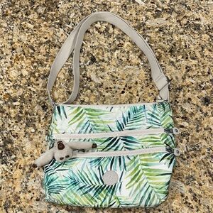 Kipling Green Tropical Leaf Print Crossbody Bag with monkey keychain
